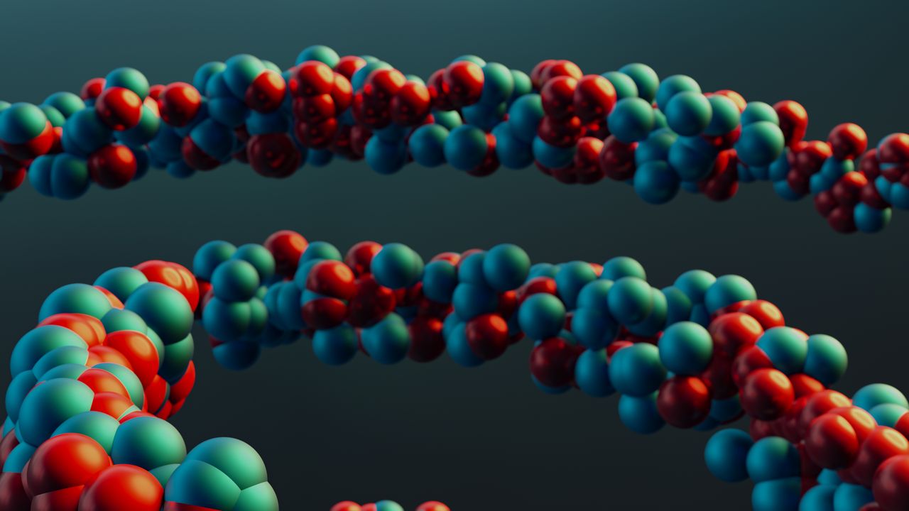 about-img Vibrant closeup of a colorful molecular model illustrating abstract scientific concepts.